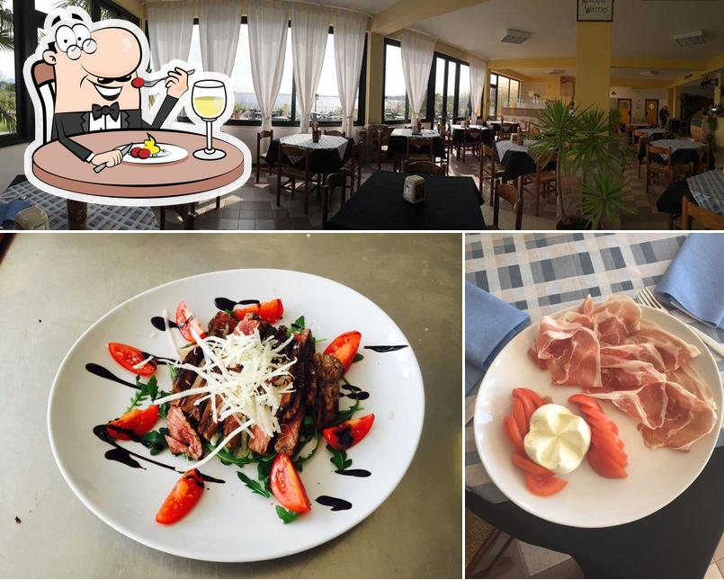 Tra le diverse cose da Ristorante Pizzeria La Cà si possono trovare la cibo e interni