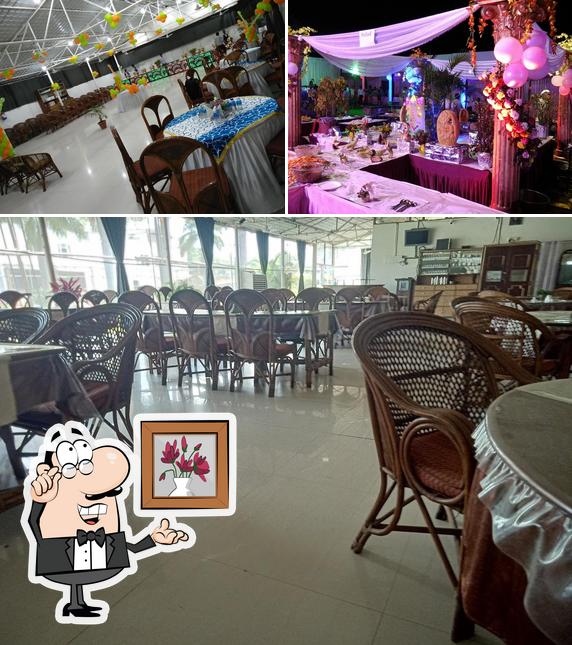 Take a seat at one of the tables at Hotel Panchanan