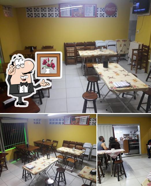 O interior do Skina Dog E Lanche Da Tia