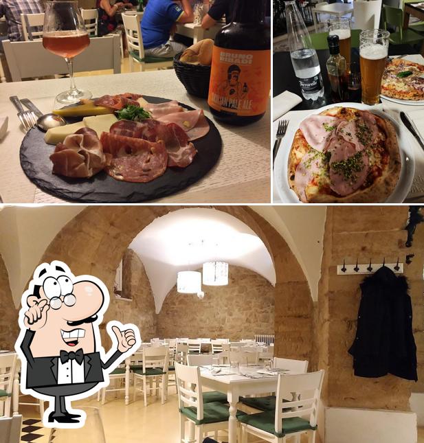 Dies ist das Aufnahme das innere und bier bei Baglio Balata Ristorante Pizzeria zeigt