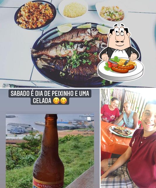 Confira a foto ilustrando comida e cerveja no Peixaria do Almirante