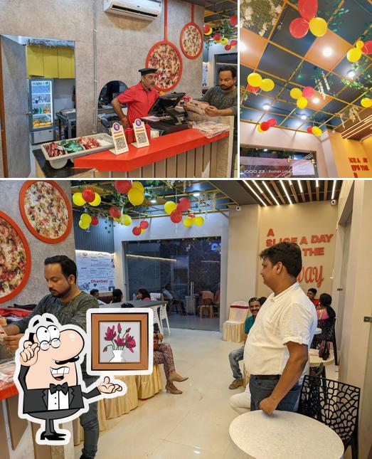 Check out how Chicago Pizza Dhanbad looks inside