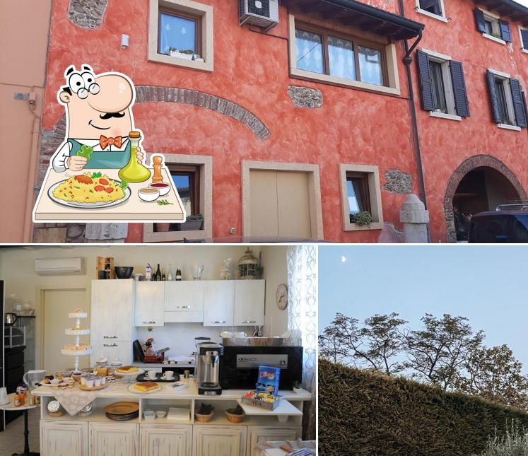 Tra le diverse cose da Residence Ca di Capri si possono trovare la cibo e interni