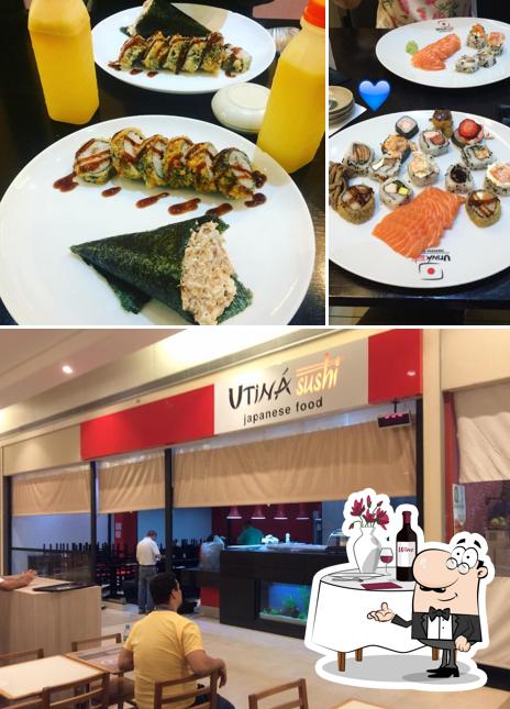 Confira a foto ilustrando mesa de jantar e interior no Utiná Sushi