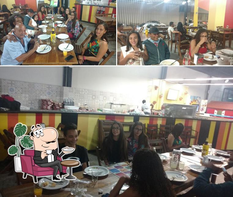 Veja imagens do interior do Pizzaria Reami à lenha
