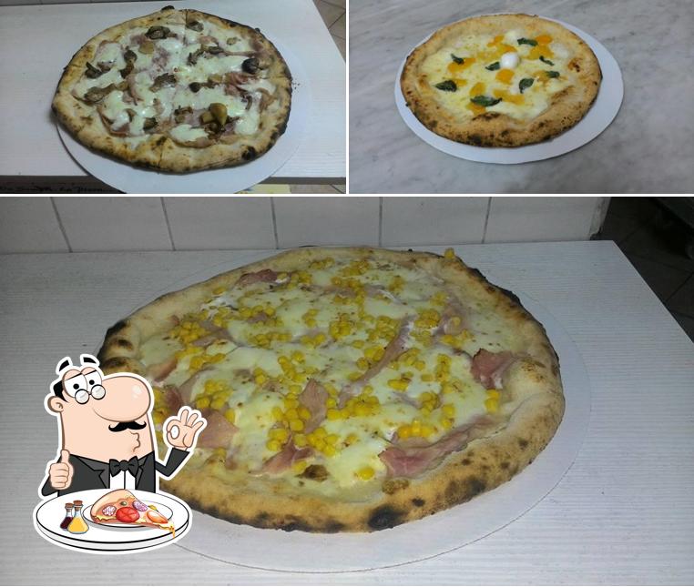 A Pizzeria L'Oasi, puoi provare una bella pizza