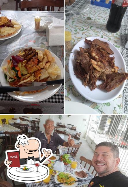 A imagem da comida e mesa de jantar a Restaurante Mariá - Comida Nordestina