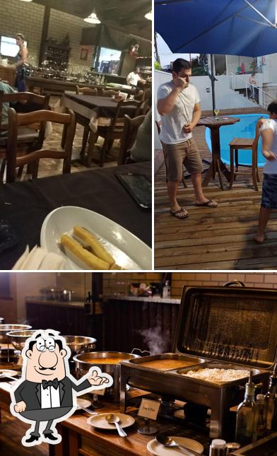 Sente em uma das mesas no Paiol Restaurante