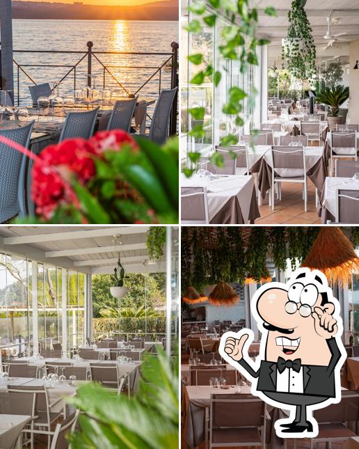 Dai un'occhiata agli interni di La Caletta ristorante sul lago