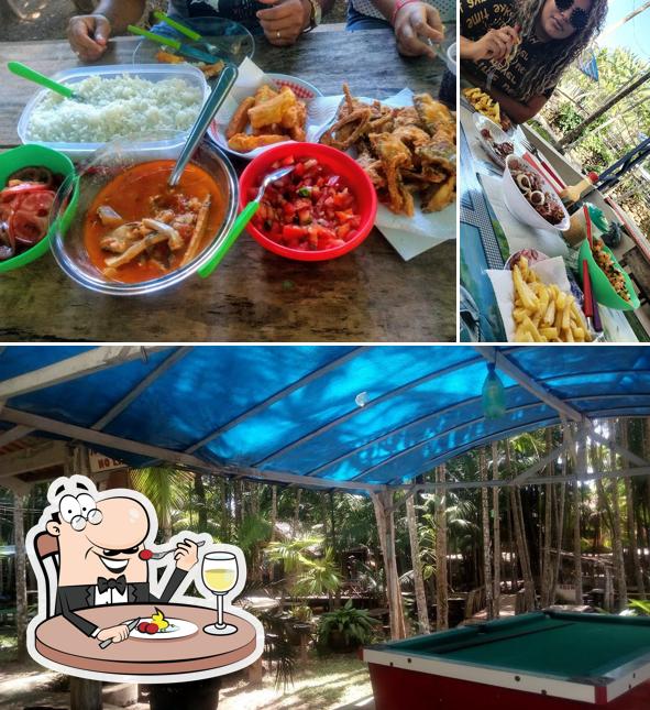 Dê uma olhada a ilustração mostrando comida e interior no Gauchinho Pesque Pague