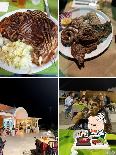 Prenditi i piatti di carne a PIZZERIA HAKUNA MATATA