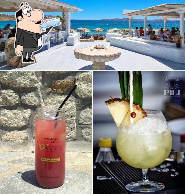 Take a look at the image displaying drink and exterior at Pili