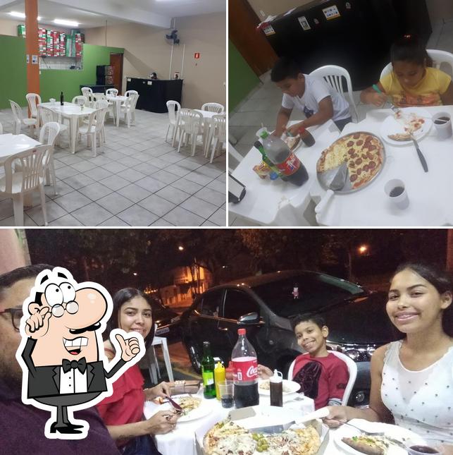 O interior do Nova Canaã Pizzaria E Delivery