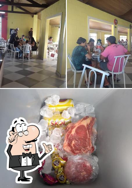 A imagem da interior e sobremesa no Churrascaria borgao