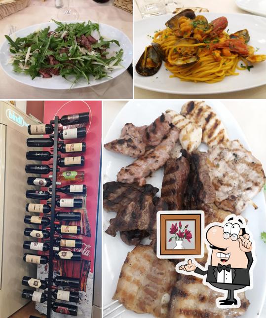 Dai un'occhiata agli interni di La Lira - Pizzeria Bisteccheria