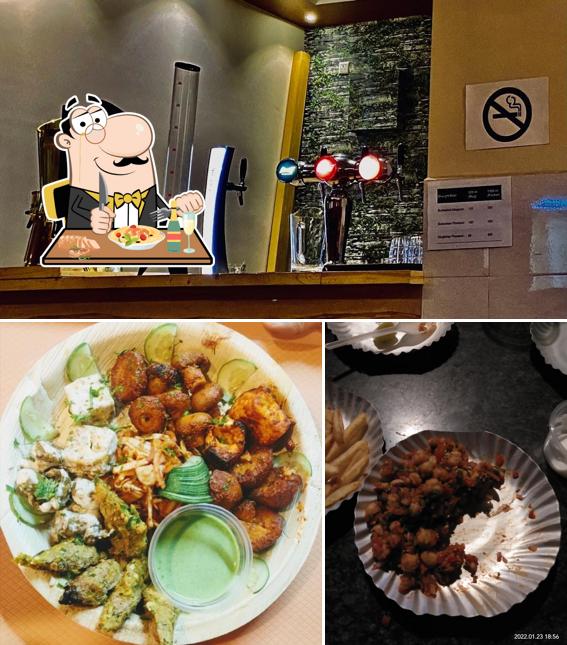 Among various things one can find food and interior at Q-GRILL Bar and Restaurant