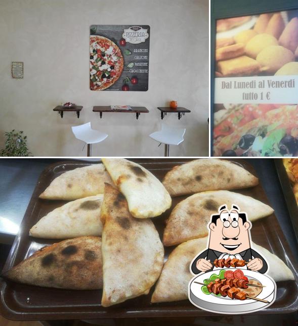 Tra le diverse cose da Pizzeria Aramini - Pizzeria dei ricordi si possono trovare la cibo e interni
