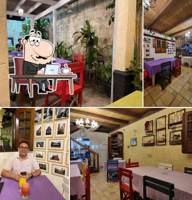 Sente em uma das mesas no Duilio Pasta e Pizza