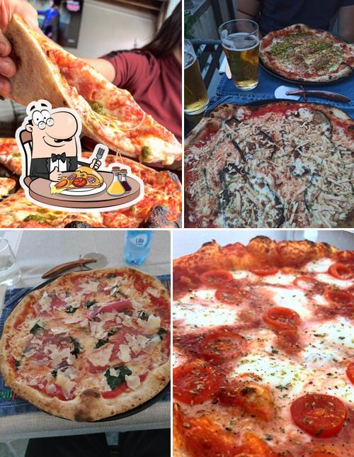 Prenditi una pizza a Real Pizza - Food & Drink