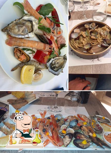 Prenez des fruits de mer à Ristorante "Oasi del porto"