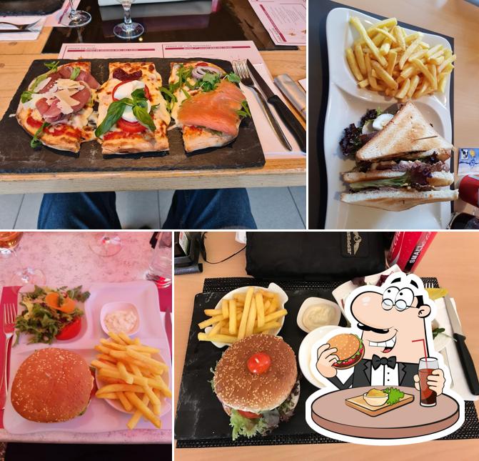 Ordina un hamburger a Terminal 60 - Restaurant de l'Aéroport