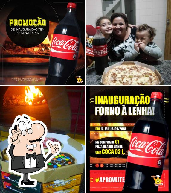 Entre diversos coisas, interior e bebida podem ser encontrados no Star Pizzas