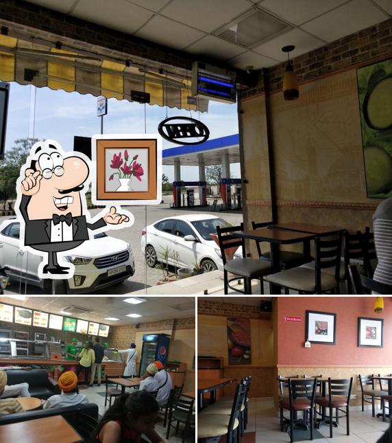 Take a seat at one of the tables at Subway Dasuya
