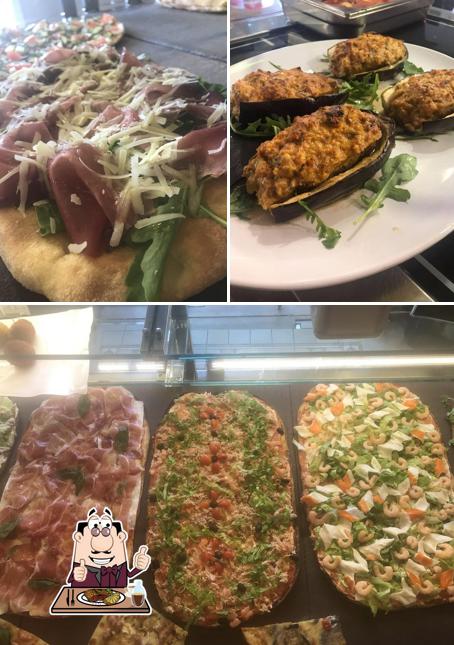 Prenditi i un pasto a base di carne a Fantasy Pizza