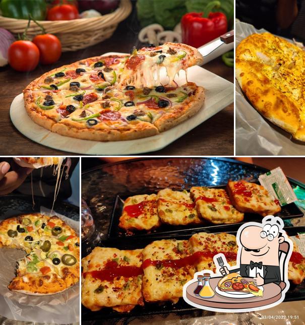 Get pizza at POKKET CAFE DANDELI