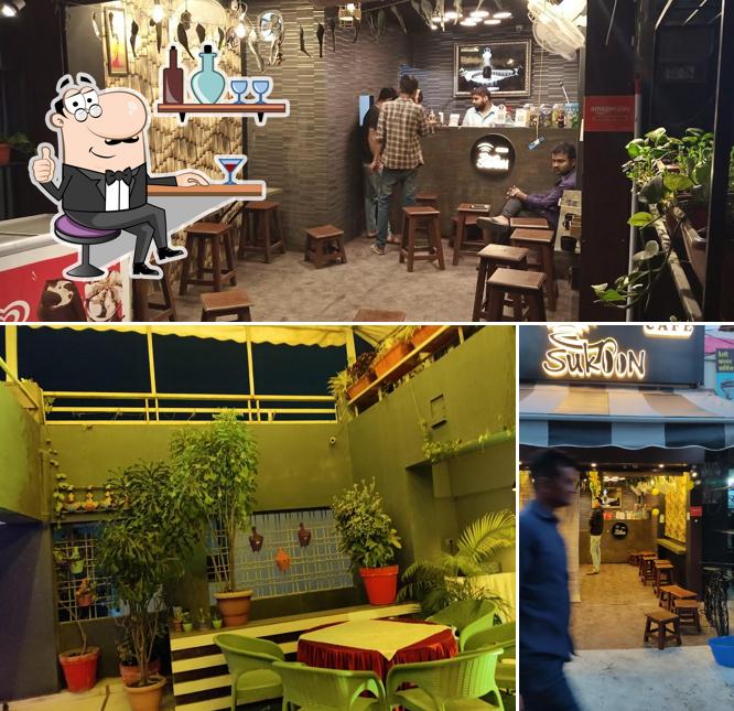 Take a seat at one of the tables at Cafe sukun
