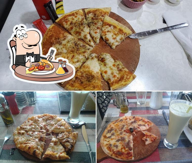 Essayez des pizzas à Restaurante Abou Taha