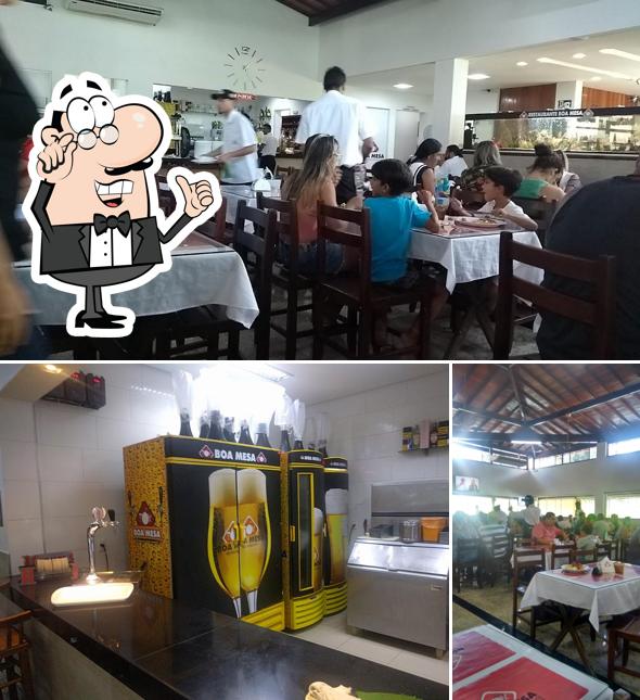 Sente em uma das mesas no Boa Mesa Restaurante