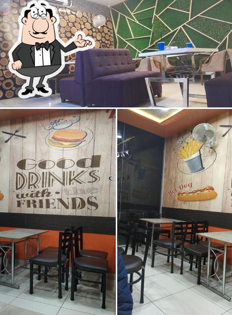 Take a seat at one of the tables at Burger BAR