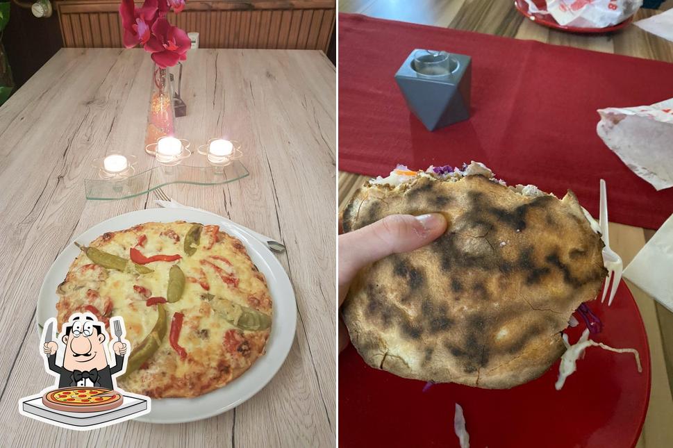 Essayez des pizzas à Malik's Bistro & Shishabar (Döner & Pizza)