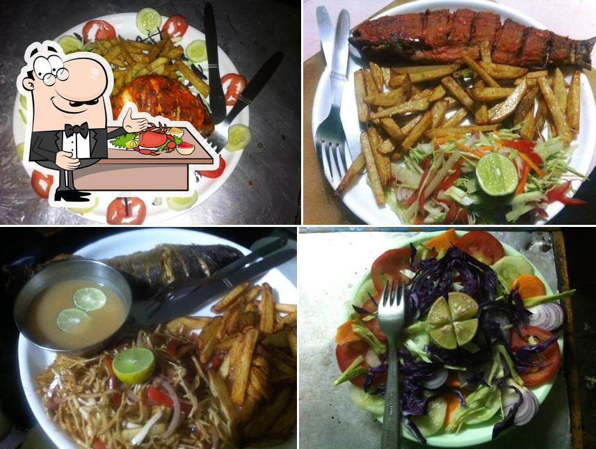 Try out seafood at Chauhan Roof Top restaurant