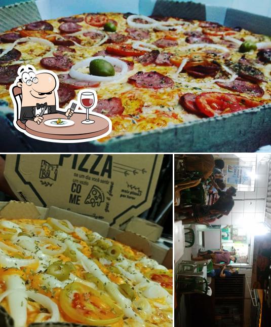 Entre diferentes coisas, comida e interior podem ser encontrados no Soni Pizzas