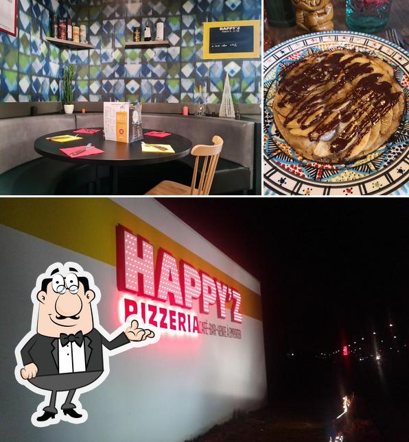 Это фото, где изображены внутреннее оформление и еда в Pizzeria Populaire (Happy'z)