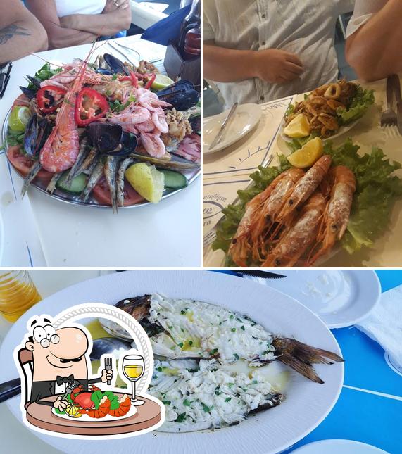 Закажите блюда с морепродуктами в "Nikos Fish Tavern"