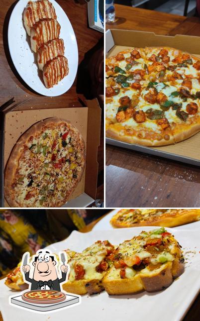 Order pizza at Coffee N Cuisines- CAFE