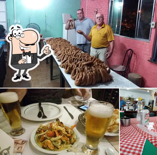 Esta é a imagem apresentando interior e comida a Casa Portuguesa