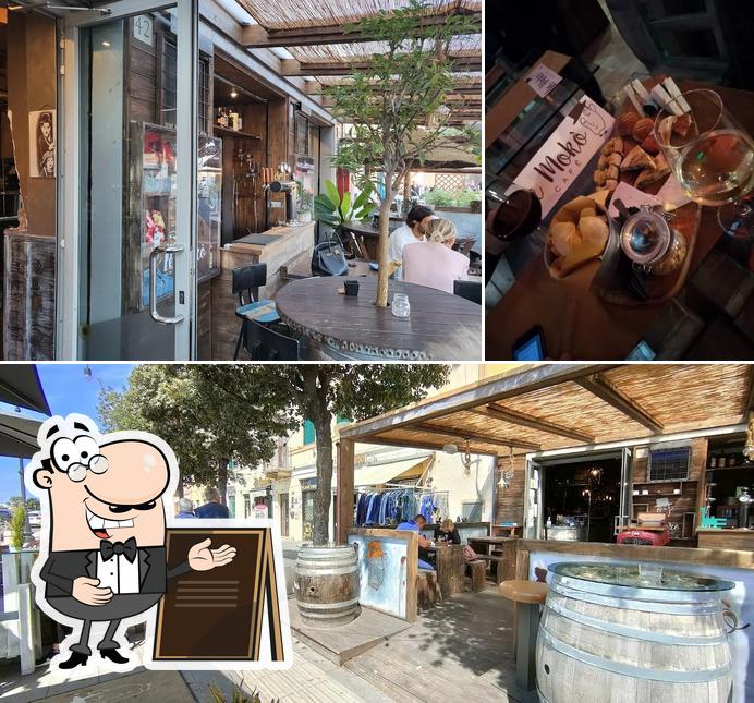 Dai un’occhiata alla immagine che mostra la esterno e vino di Cafè Le Mokò