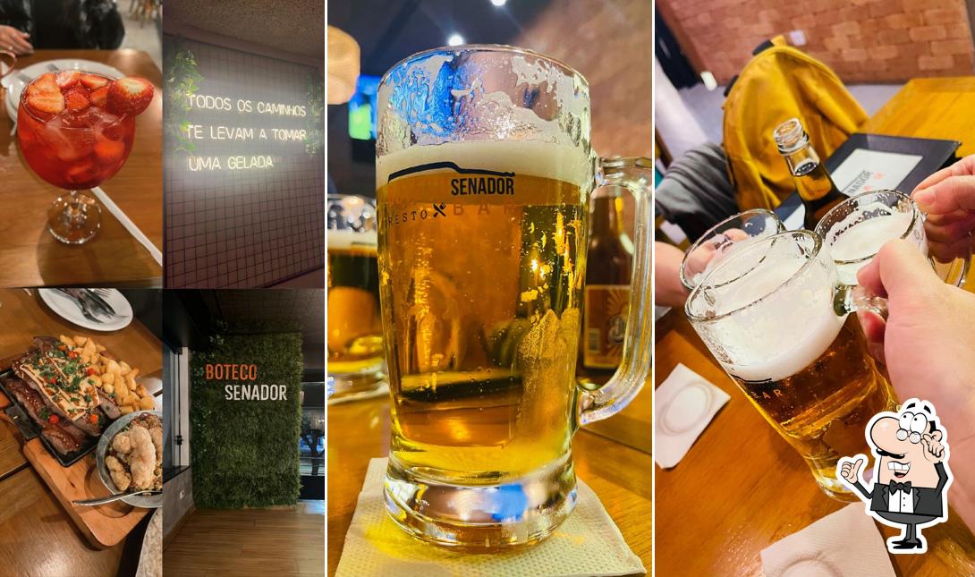 Sente em uma das mesas no Boteco Senador