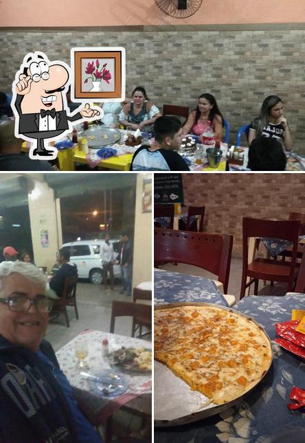 O interior do Pizzaria Real