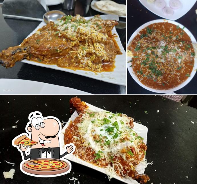 Try out pizza at Hotel Marathi Bana