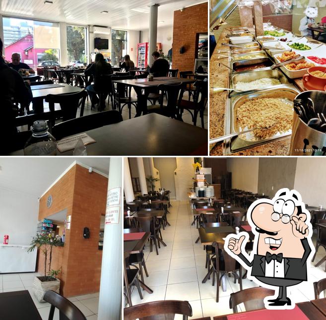 O interior do Restaurante Na Grelha