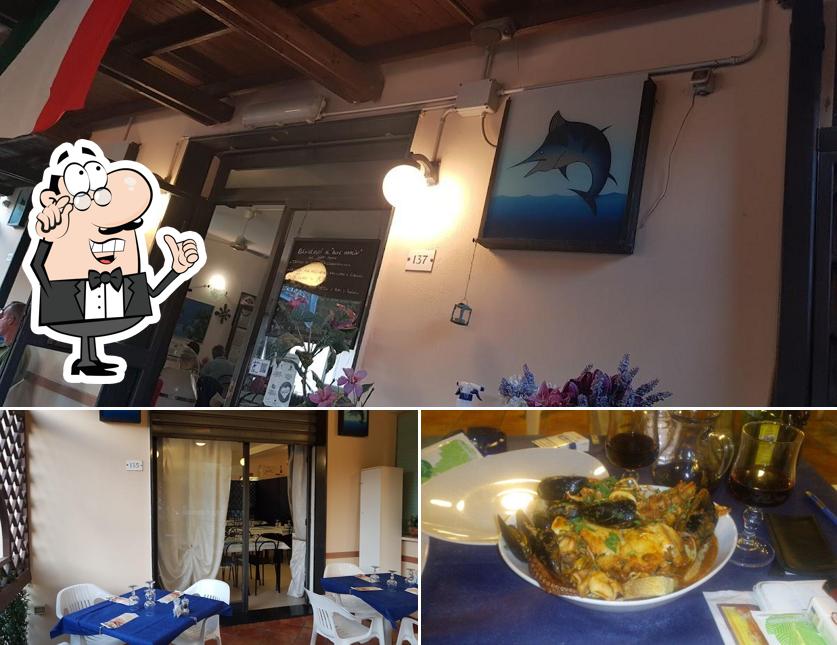 La immagine della interni e cibo di RISTORANTE PIZZERIA BLUE MARLIN