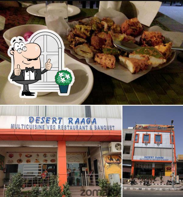 This is the picture displaying exterior and dining table at Hotel Desert Raaga Restaurant