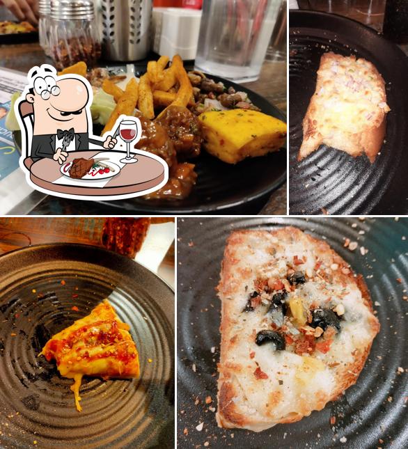 William John's Pizza Superlative Anand