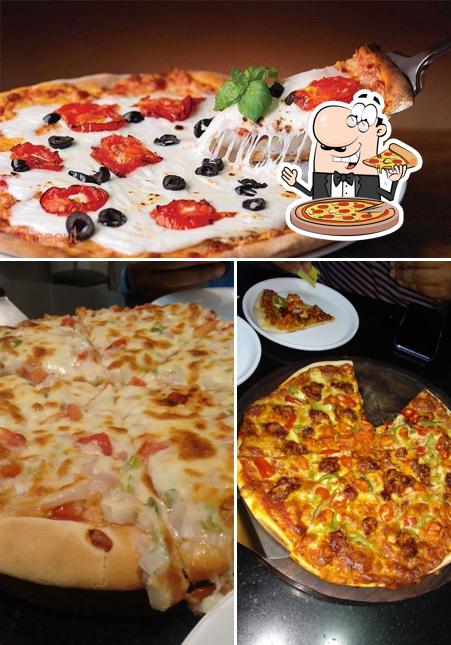 Get pizza at Smokin' Joe's Pizza