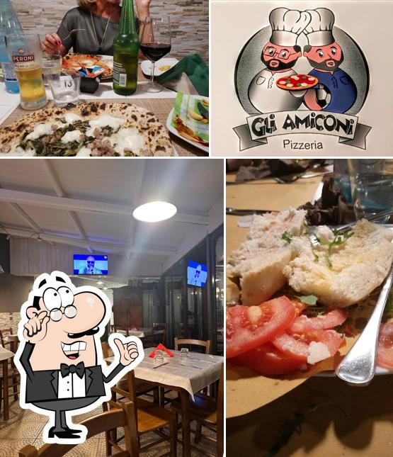 Dai un'occhiata agli interni di Pizzeria Gli amiconi